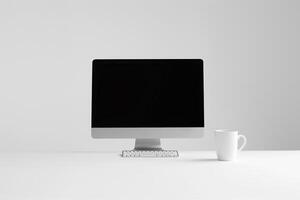 Computer mockup with coffee cup and sticky notes on a white desk creating a professional and inviting workspace background photo