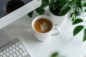 White desk featuring computer mockup sticky notes and coffee cup perfect for digital work and office setup background photo