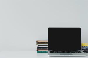 Laptop Mockup with Coding Books on Desk   Professional and  Background photo