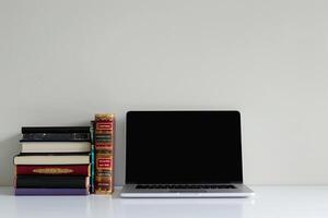Laptop Mockup with Coding Books   Effective Workspace with  Arrangement photo