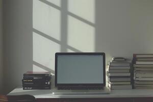 Laptop Mockup with Coding Books    and Functional Workspace Arrangement photo
