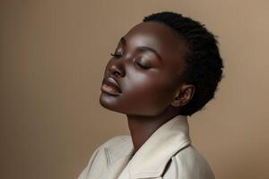Model in a sophisticated desktop outfit set against a beige background photo