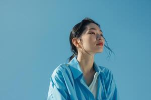 Model engaged in work at desktop station background photo