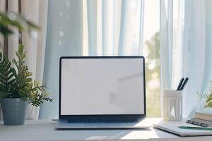 Efficient Laptop Mockup Background with notepad and pens on white desk photo