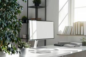 Computer Mockup Background on a White Desk with Books photo