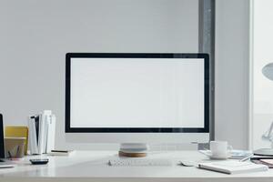 Computer Mockup Background on a White Desk with Papers photo