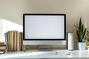 Computer Mockup Background on a White Desk with Books photo