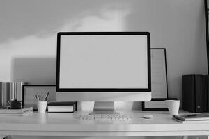 Computer Mockup Background on a White Desk with Papers photo