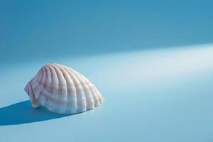 Blue Gradient Background with Single Seashell photo