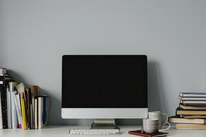 Computer Mockup Background with Books on White Desk Study Area Background ed photo