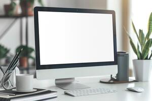 Computer Mockup Background on White Desk with Writing Materials photo