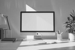 Desk with Computer Mockup and Writing Materials photo