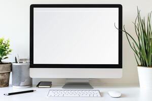 Office Desk Setup with Computer Mockup and Writing Supplies photo