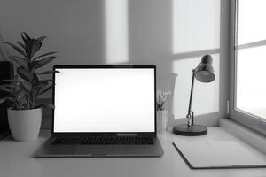 Laptop Mockup with Blank Notebook Open on White Desk photo