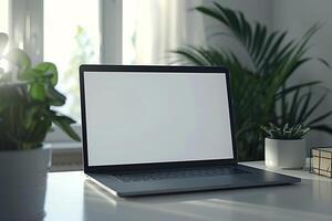 Laptop Mockup with Open Notebook on White Desk for   Writing and Work Setup photo