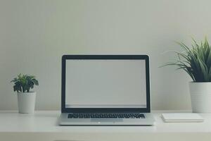 White Desk Background with Laptop Mockup and Open Notebook for   Writing Setup photo