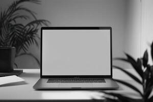 Laptop Mockup with Open Notebook on White Desk for   Writing Background photo