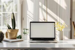 Laptop Mockup with Open Notebook on White Desk for   Writing Background photo