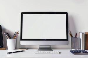 Computer Mockup with Notebooks and Pens on White Desk for Writing and Editing photo