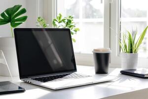 Writing and Work Setup with Laptop Mockup and Open Notebook on White Desk Background photo