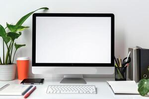 Computer Mockup with Notebooks and Pens on White Desk for Writing and Editing photo