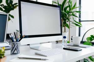 Computer Mockup on White Desk with Notebooks and Pens for Writing and Editing photo