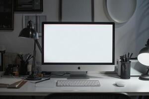 Computer Mockup on White Desk with Notebooks and Pens for Writing and Editing photo