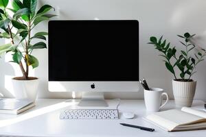 Computer Mockup with Notebooks and Pens on White Desk for Enhanced Writing and Editing photo