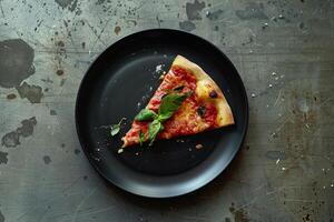 Single Slice of Pizza with Toppings on   Plate with Textured Surface photo