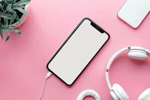 Mobile Device Mockup with Headphones in Digital Workspace Background photo
