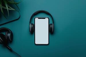 Mobile Device Mockup Screen with Headphones in Tech Workspace Background photo