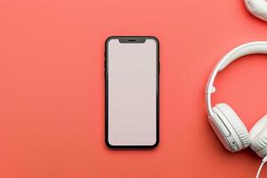 Mobile phone mockup featuring screen and headphones in a versatile tech setup background photo