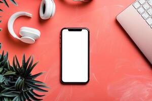 Mobile phone mockup with screen and headphones in a tech centered background photo