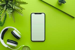Mobile phone mockup with screen and headphones in an efficient tech environment photo