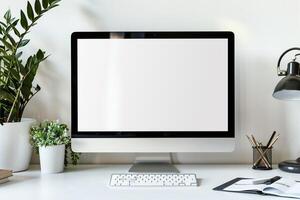 Computer Mockup on a White Desk with Marketing Materials for a Comprehensive Setup photo