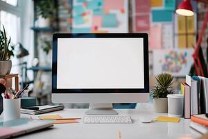 Computer Mockup on a White Desk with Marketing Materials for a Cutting Edge Office Setup photo