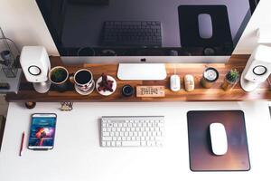 Overhead   of Computer Mockup on Desk with Updated   Features and Efficient Layout photo