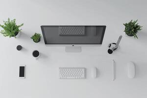 Overhead   of a Computer Mockup on a Desk with Desktop Setup Background photo
