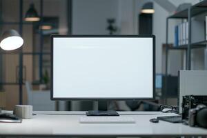 Computer Mockup on a White Desk with Tech Gadgets Around Background photo