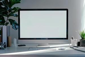Computer Mockup on a White Desk with Tech Gadgets Around Background photo