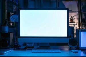Computer Mockup on a White Desk Surrounded by Various Tech Gadgets photo
