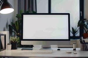 Computer Mockup on a White Desk with Tech Gadgets and Various Electronic Components photo