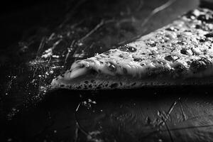 White Cheese Pizza Slice with Illuminated Dark Background photo