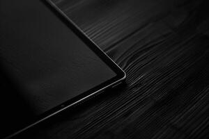 Noir Tablet Mockup with Glossy Black Finish and Tech Driven Design photo