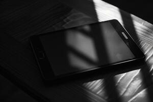 Noir Tablet Mockup with Refined Black Background and Subtle Design photo