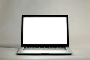 Laptop Mockup with Blank Screen on White Surface Suitable for Professional Use photo