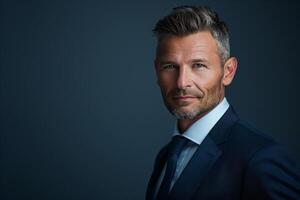 Head of a businessman in a classic navy Background projecting confidence photo