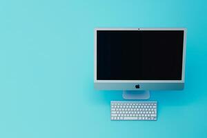 Desktop computer mockup with blank screen on  background photo