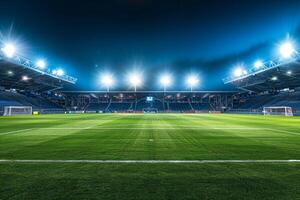 Wide   of Soccer Field with Stadium Lights On and Empty Stands Capturing a Spacious and Illuminated Arena photo