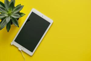 Tablet Screen Mockup with Lime Green Studio and Potted Plant Tech Savvy Design photo